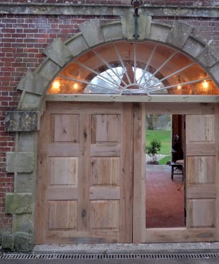 Bespoke metal crescent window
